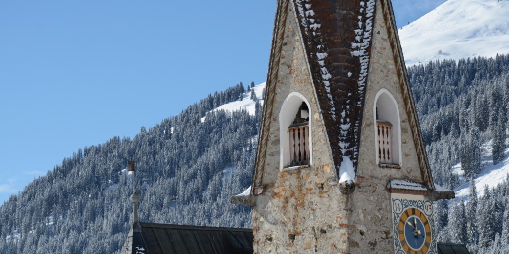 The hands of the church tower clock seem to turn slower here.